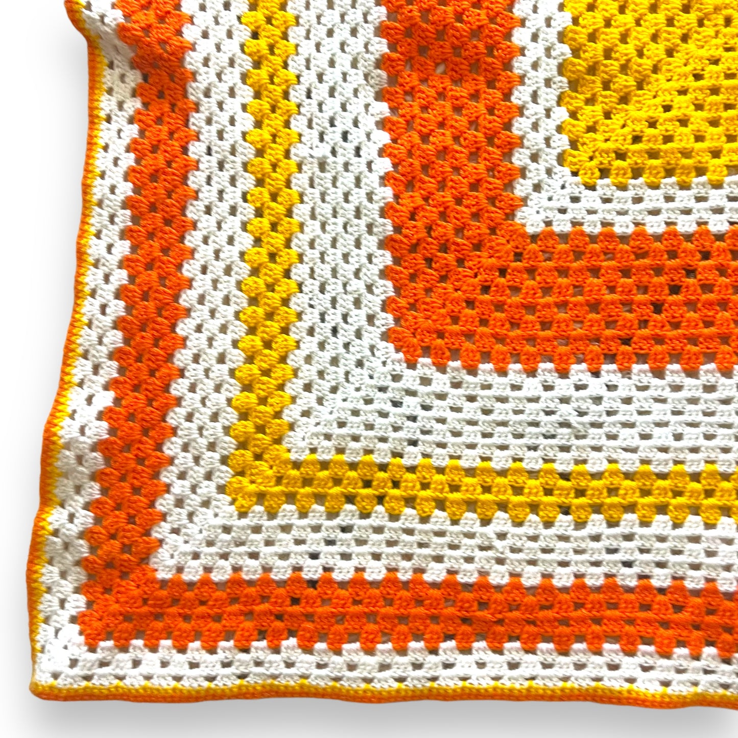 Orange, yellow and white crochet knit blanket