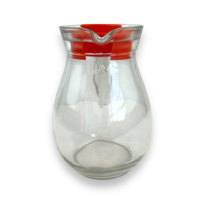 Clear jug with red plastic lid