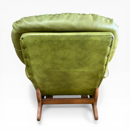 Olive Green Vinyl Lounge Armchair with Timber Sleigh Base
 (rip on side)