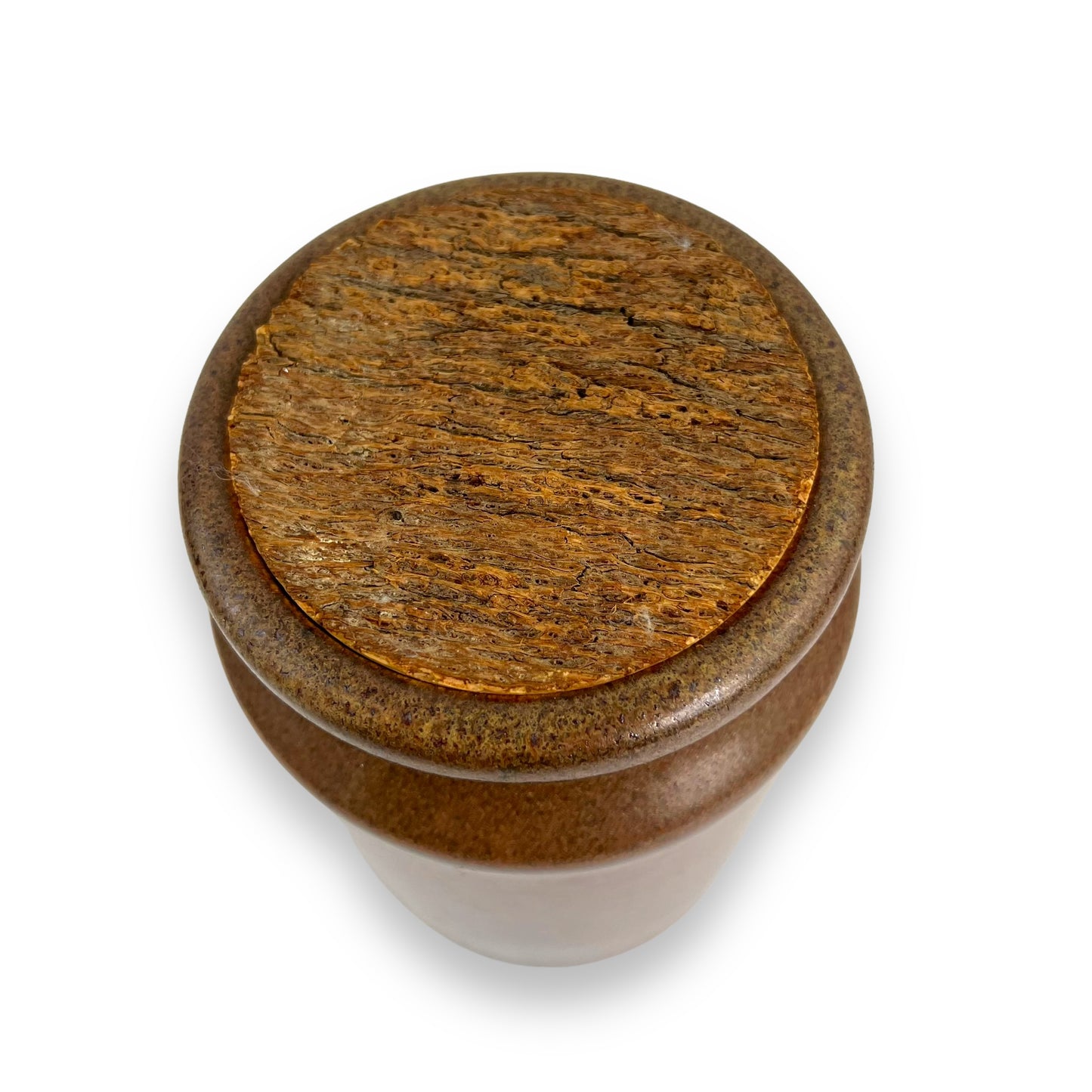 Brown pottery jar with cork lid