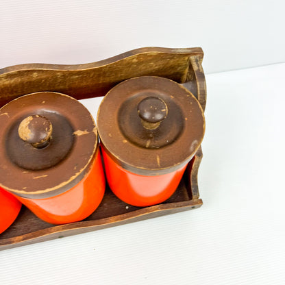 Orange Kitchen Storage Canister Jars with wooden lids and wooden hanging shelf