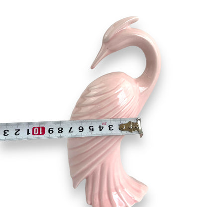 Pink ceramic heron bird statue
