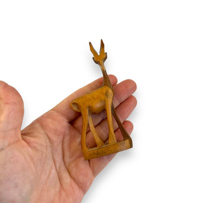 Small wooden antelope carved wooden statue