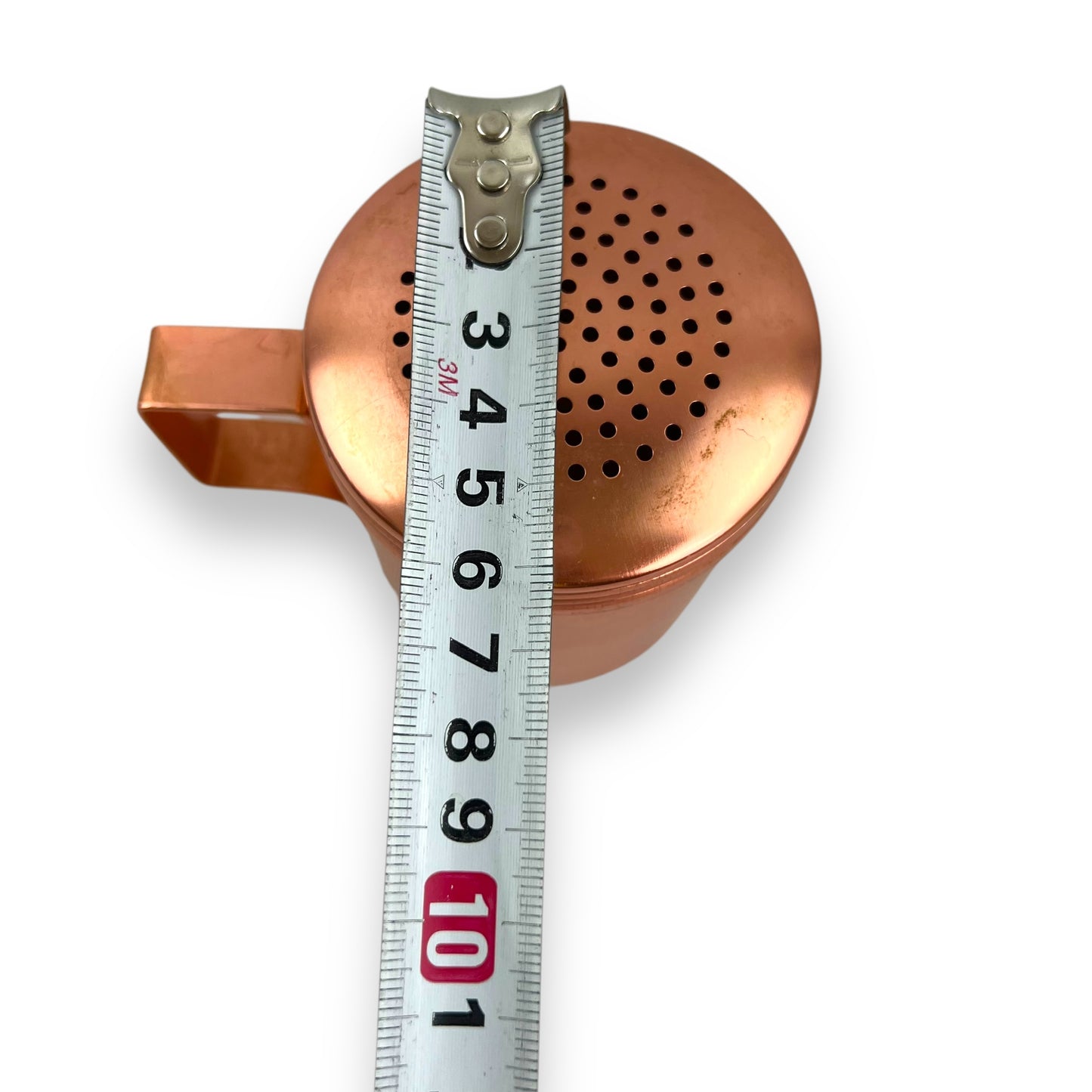 Rose gold coloured metal condiment shaker