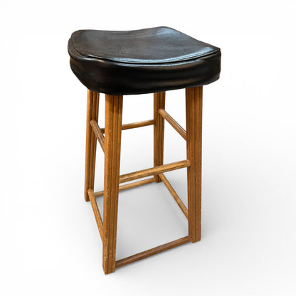 Wooden stool with black top