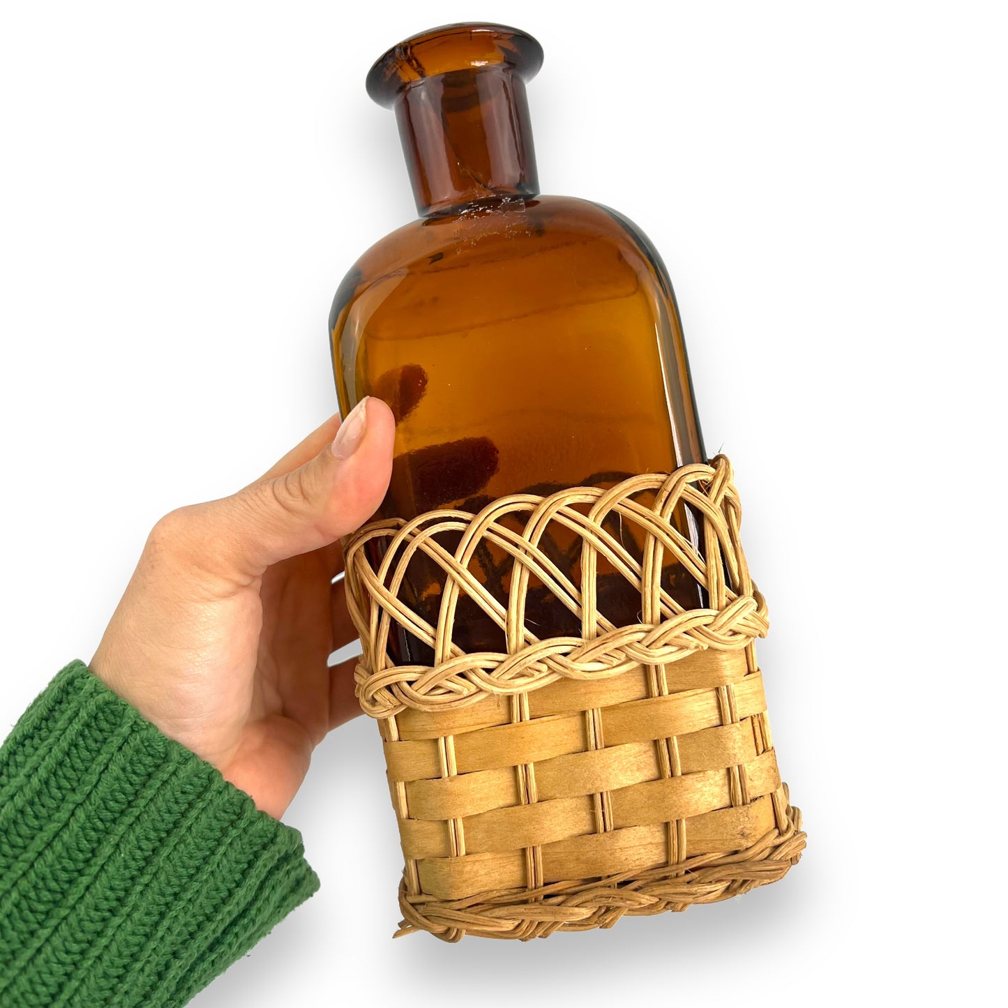 Amber glass decanter bottle with cane base and cork stopper
