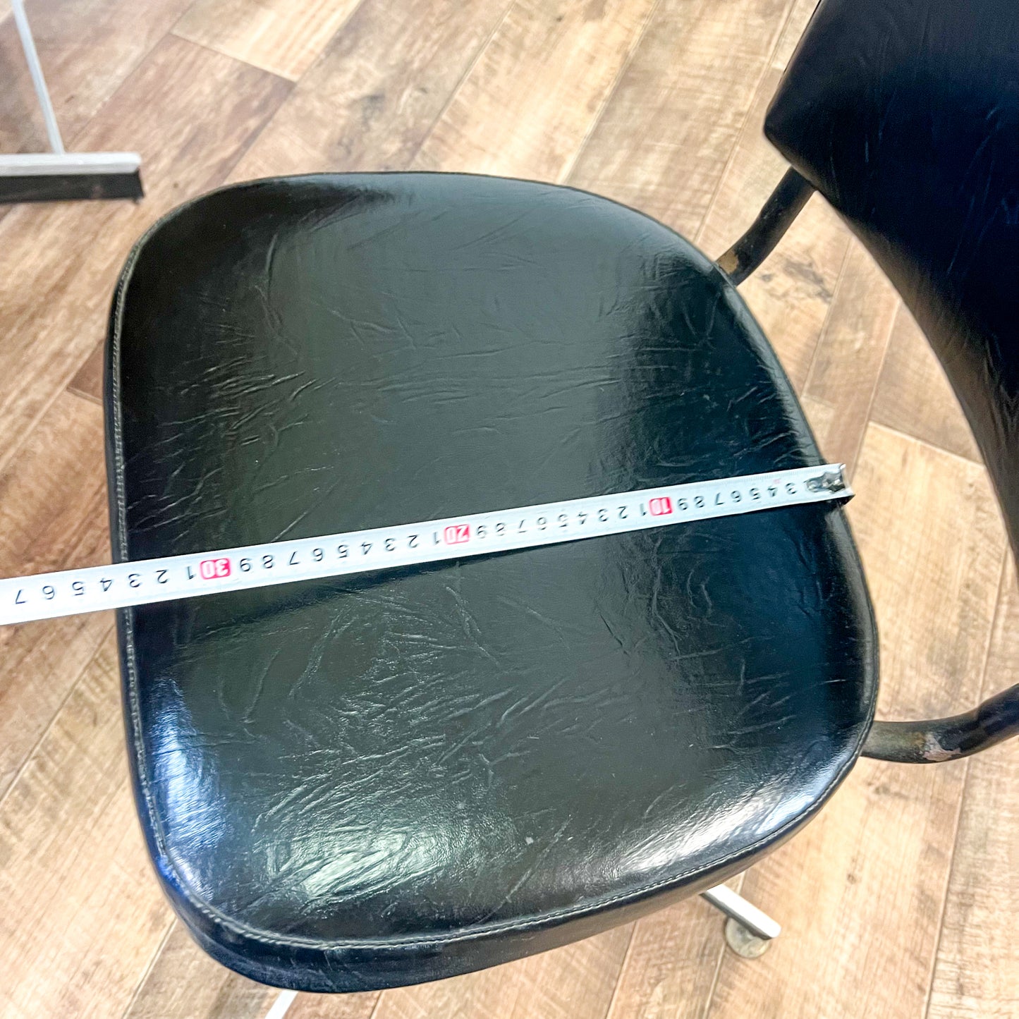 Brown Laminate Octagon Dining Table and 4 Black swivel dining chairs