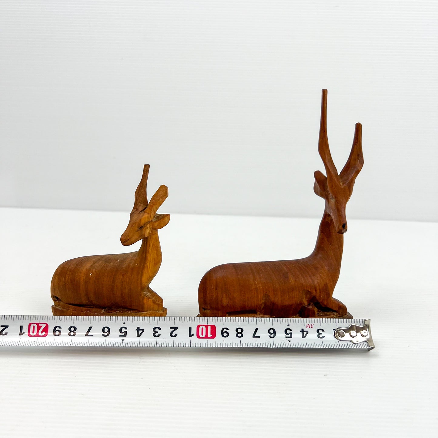 Carved Wooden Laying Antelope Statue Pair