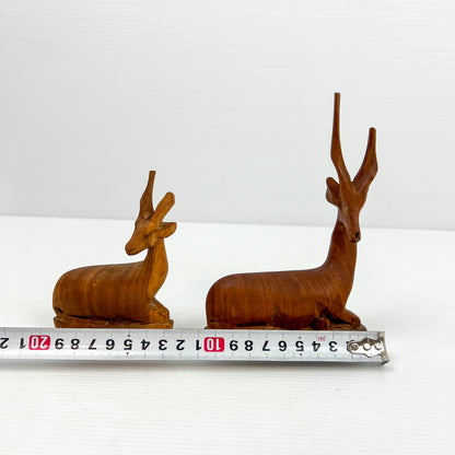 Carved Wooden Laying Antelope Statue Pair