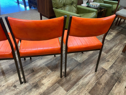 Set of 4 Mid Century Bright Orange Vinyl Dining Chairs with Dark Brown Steel Frames
