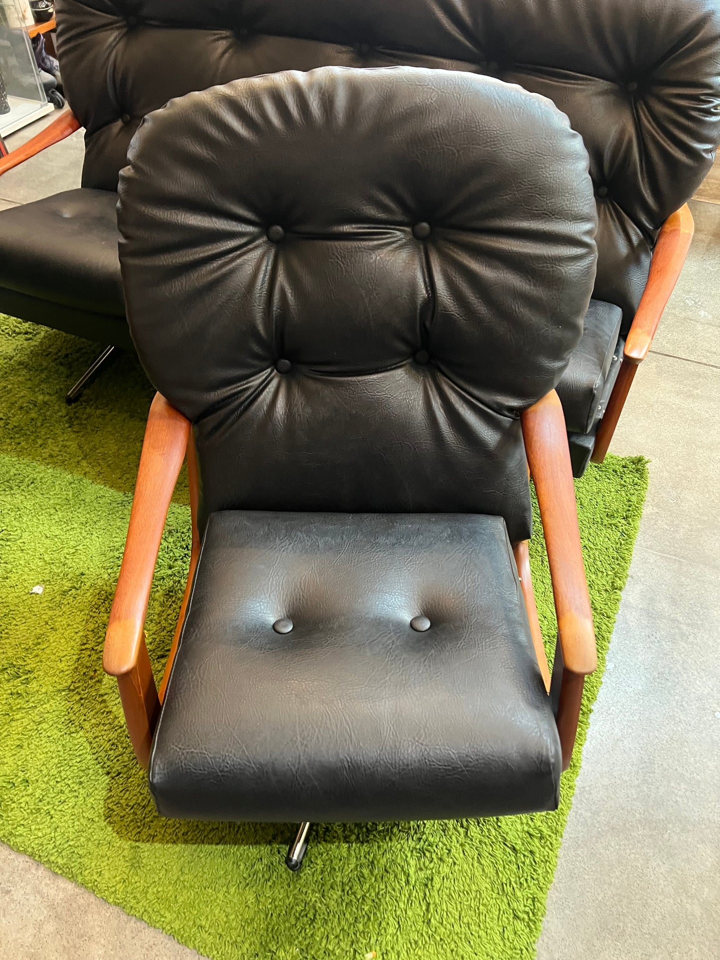 2. Black Vinyl Swivel Armchair with Timber Arms