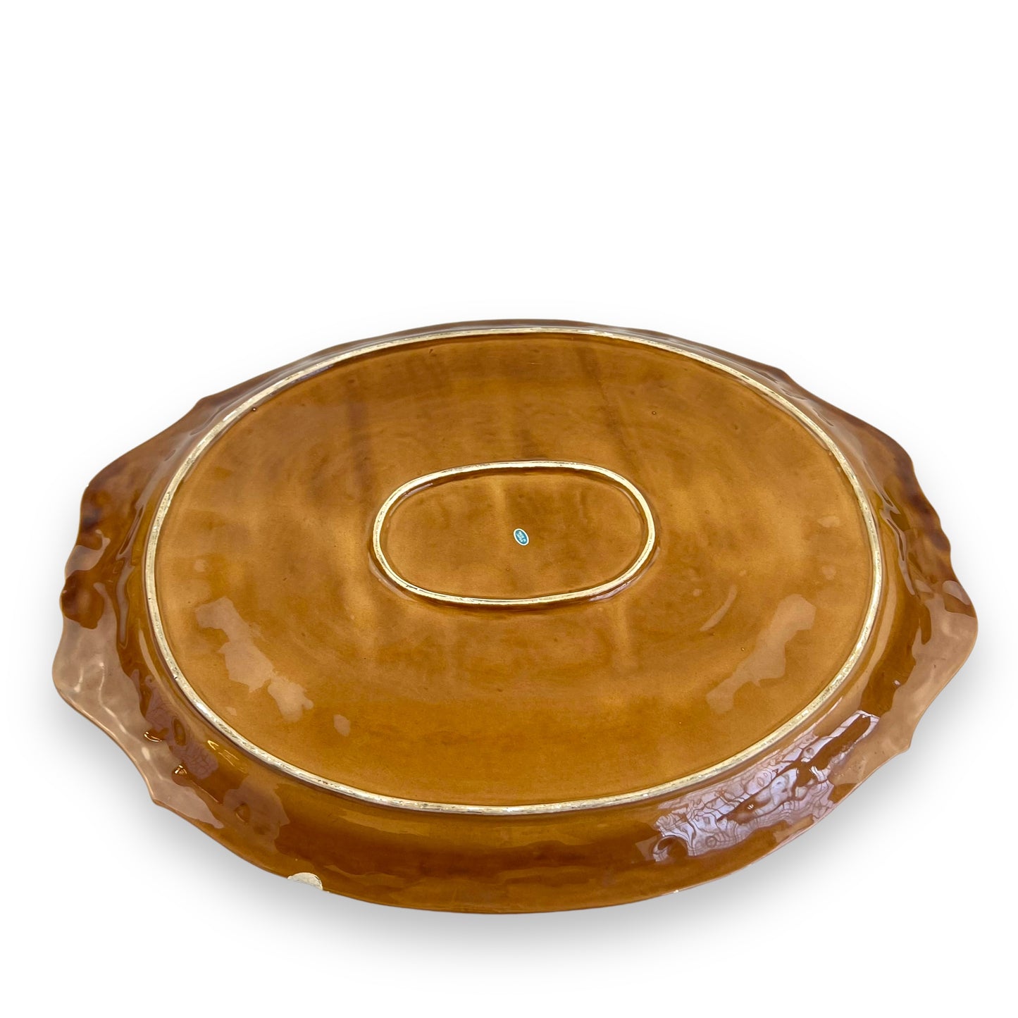 Large orange and brown ornate ceramic serving platter