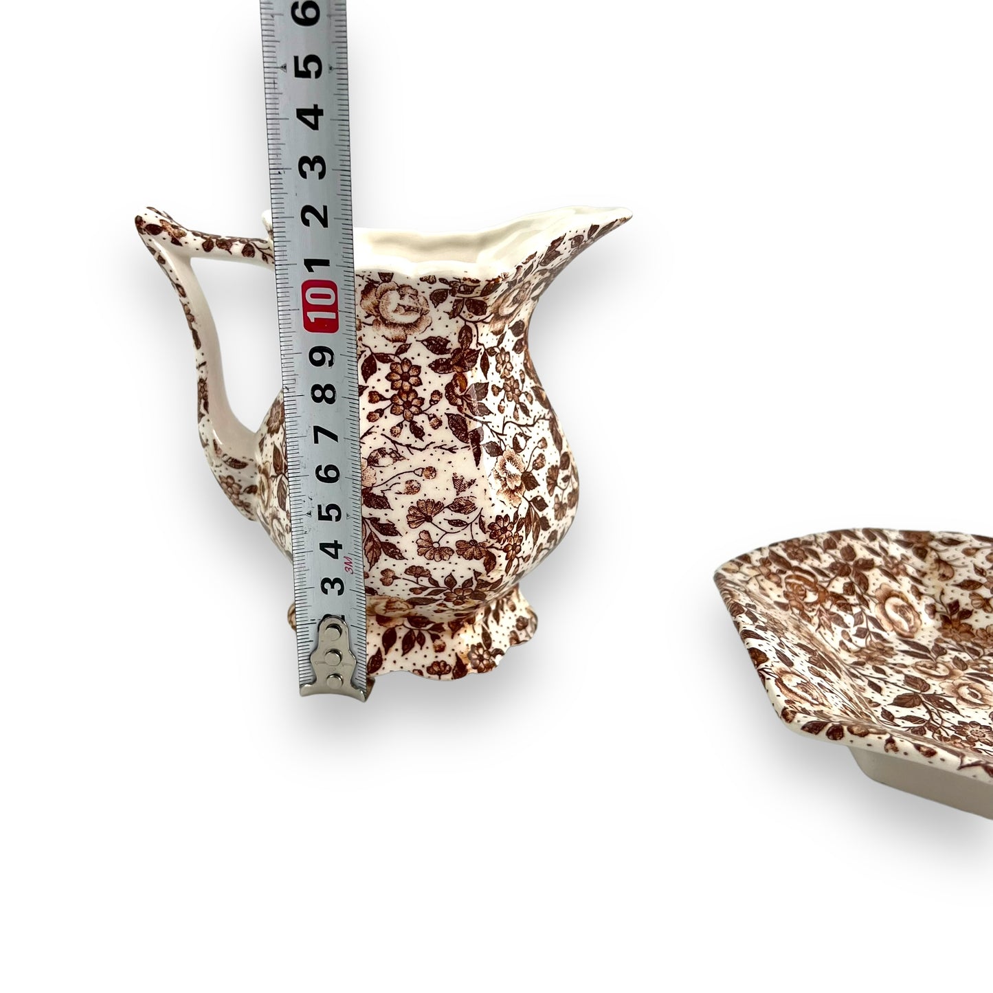 Brown flower patten jug & saucer