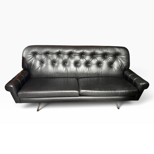 Black Button-Tufted Three-Seater Lounge with Chrome Legs