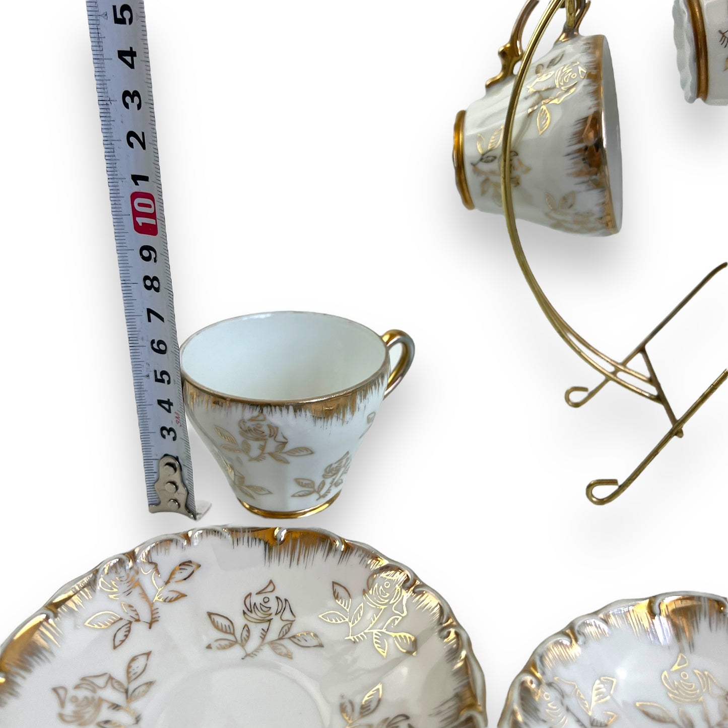 Vintage Japan Tea Cup and Saucer Set with Gold Accents and Floral Design on Brass Rack - 11 piece set