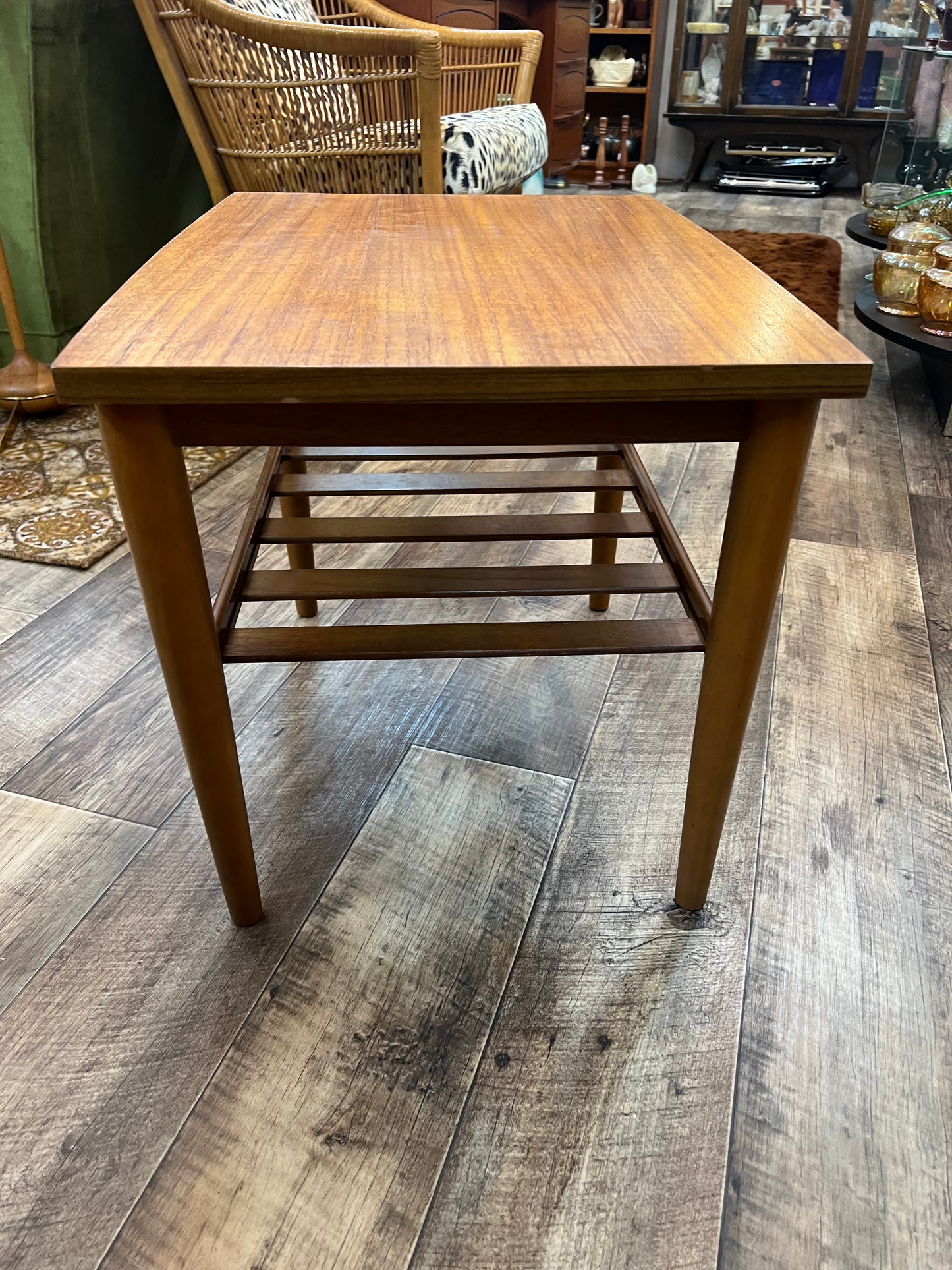 Mid century Teak side table with slated magazine shelf