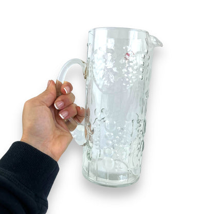 Pressed flower pattern clear glass pitcher