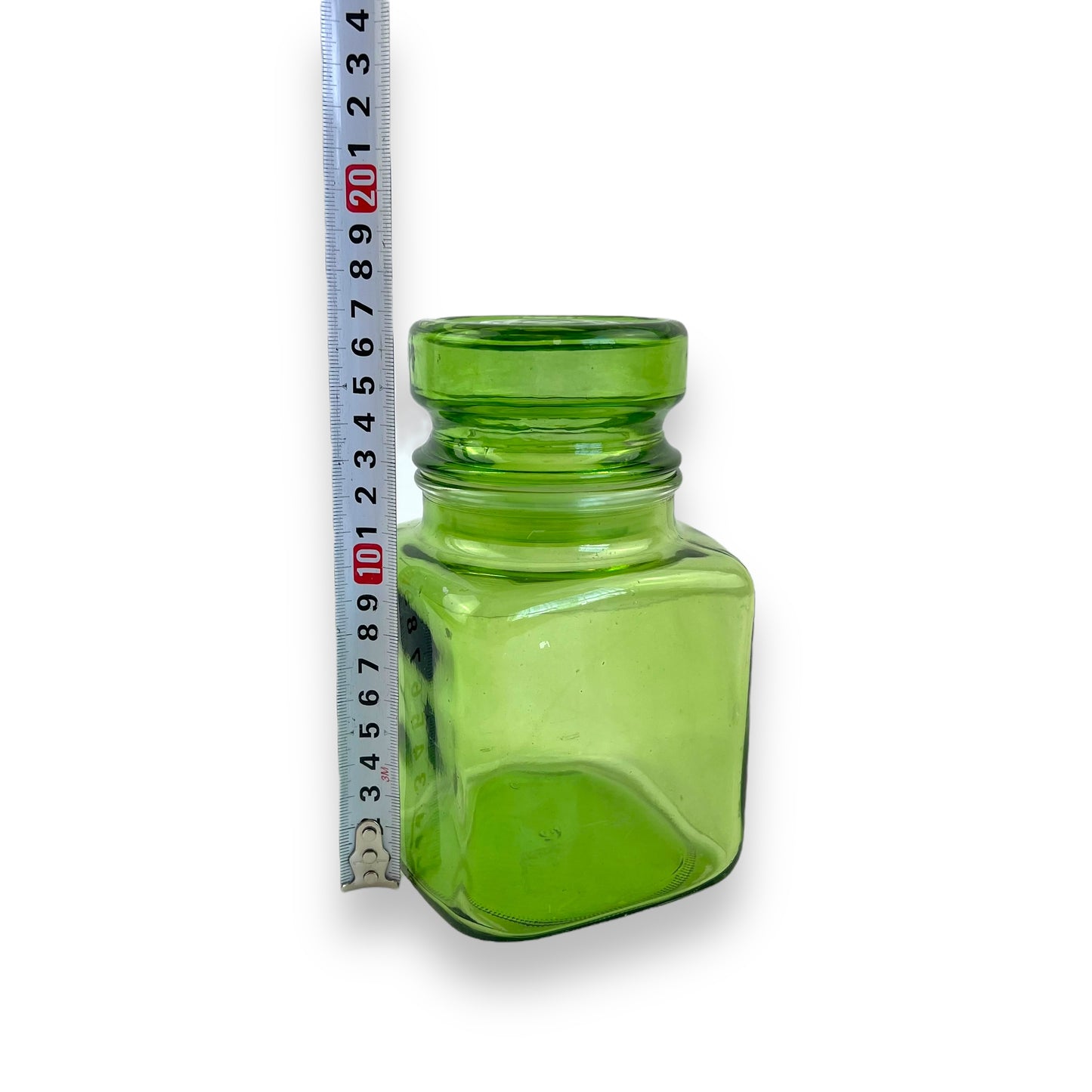 Green glass jar with suction lid