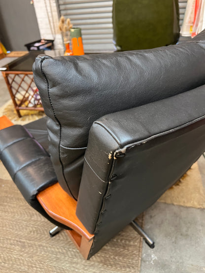 2. Mid-Century Black Leather Swivel Lounge Chair