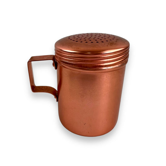 Rose gold coloured metal condiment shaker