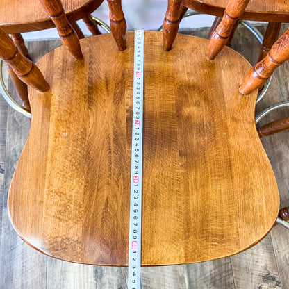 Brown Captains Mate timber swivel barstool with metal ring footrest