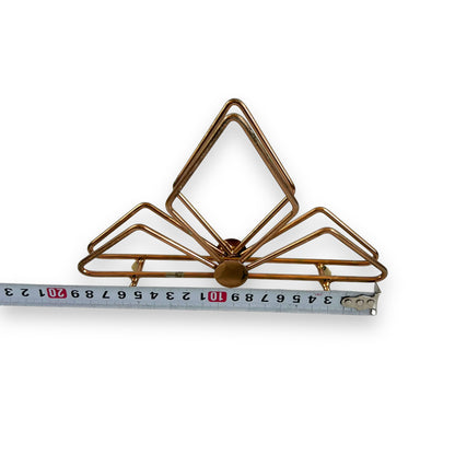 Copper coloured triangle design letter / napkin holder