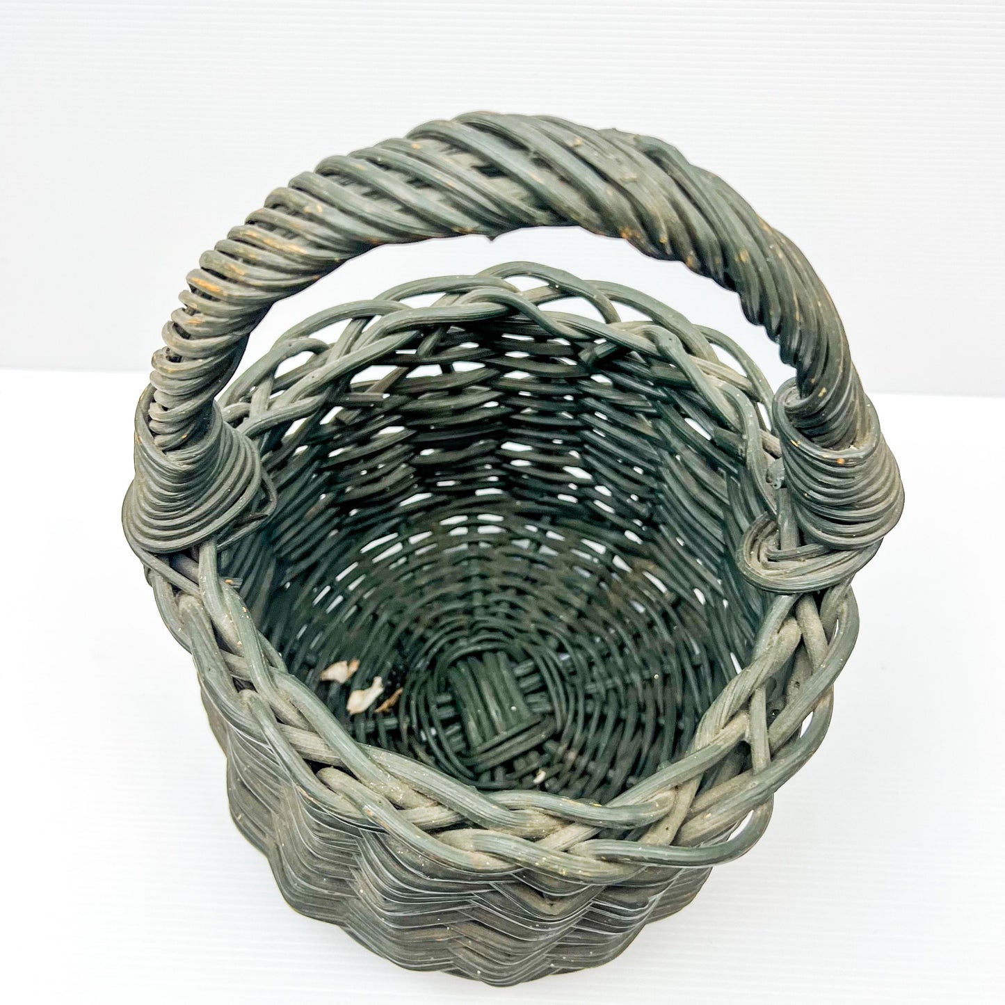 Small Green painted cane basket with handle. Rustic Elegant Decor.