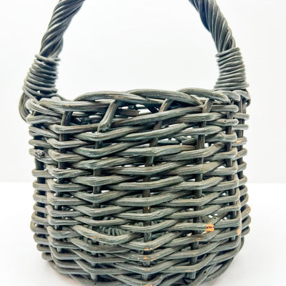 Small Green painted cane basket with handle. Rustic Elegant Decor.