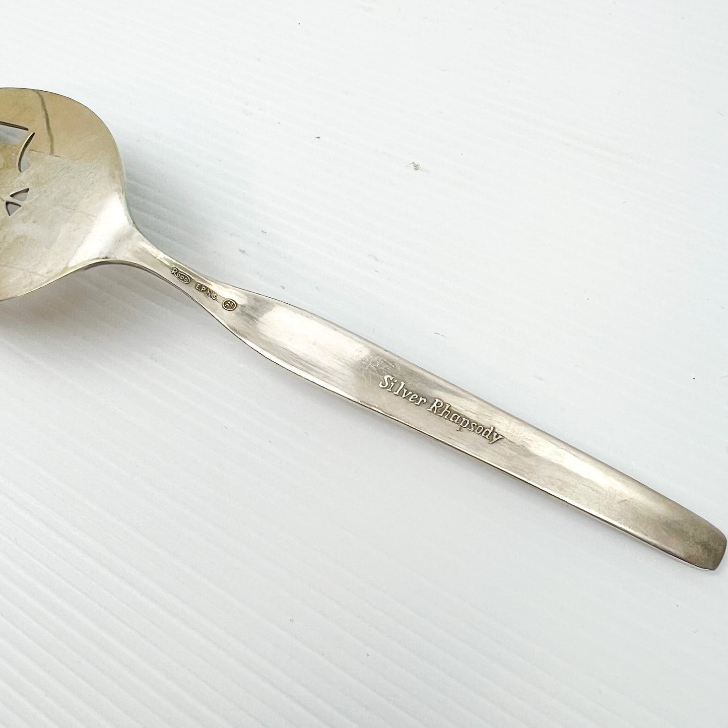 Silver cake serving utensil
