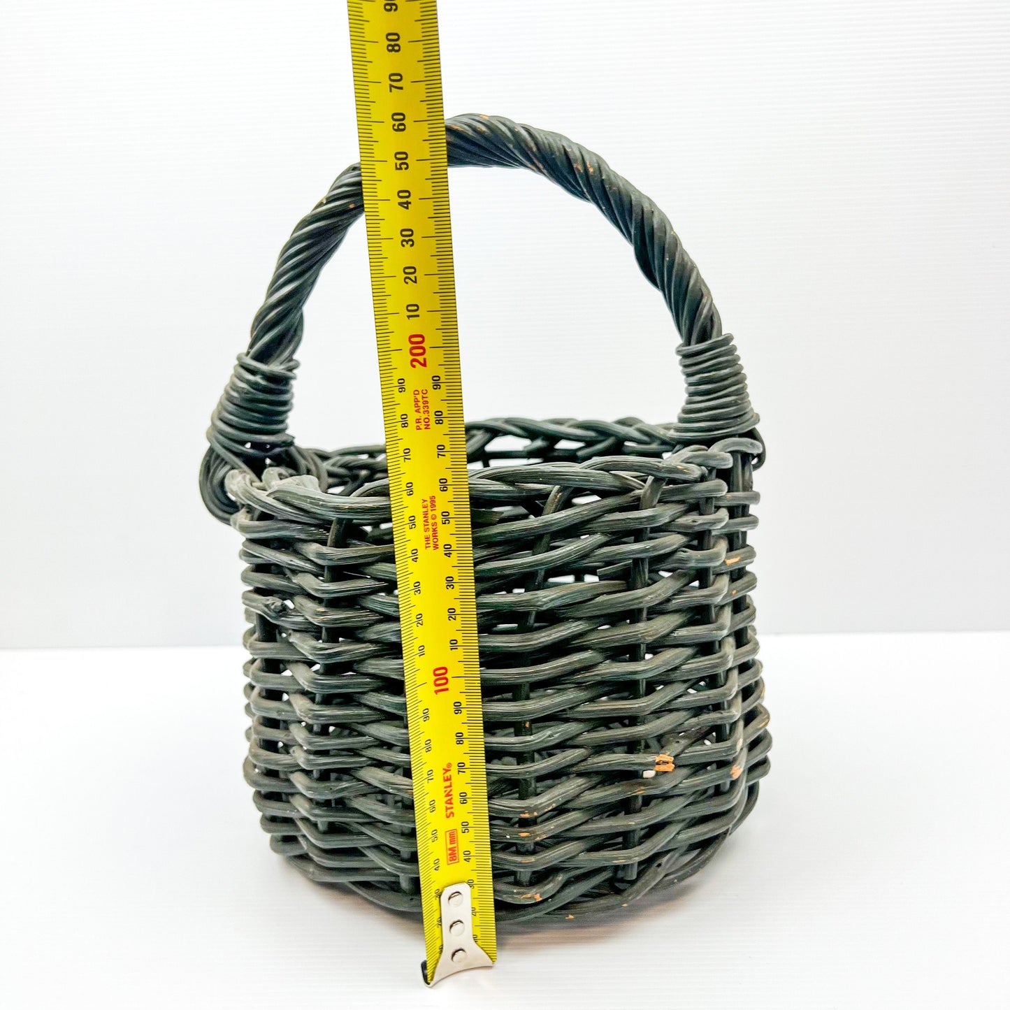 Small Green painted cane basket with handle. Rustic Elegant Decor.