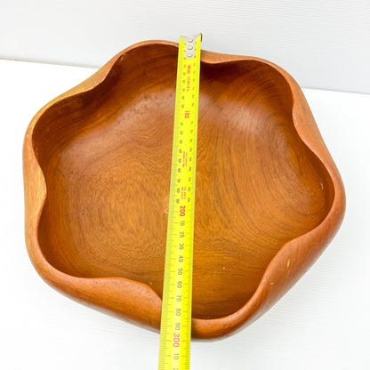 Large wooden serving bowl with ripple Wave edge