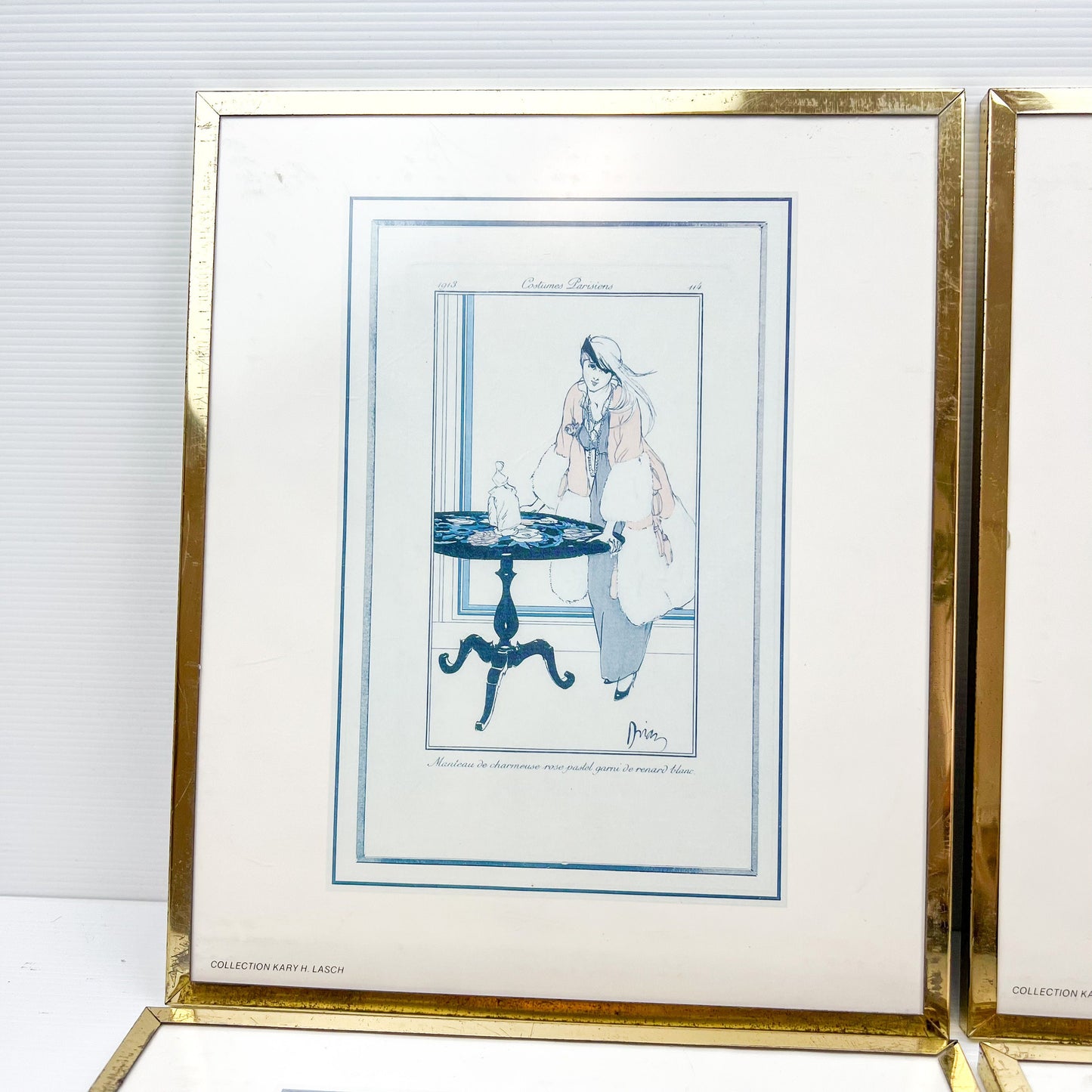 Vintage prints of ladies in elegant clothing brass frames set of 4