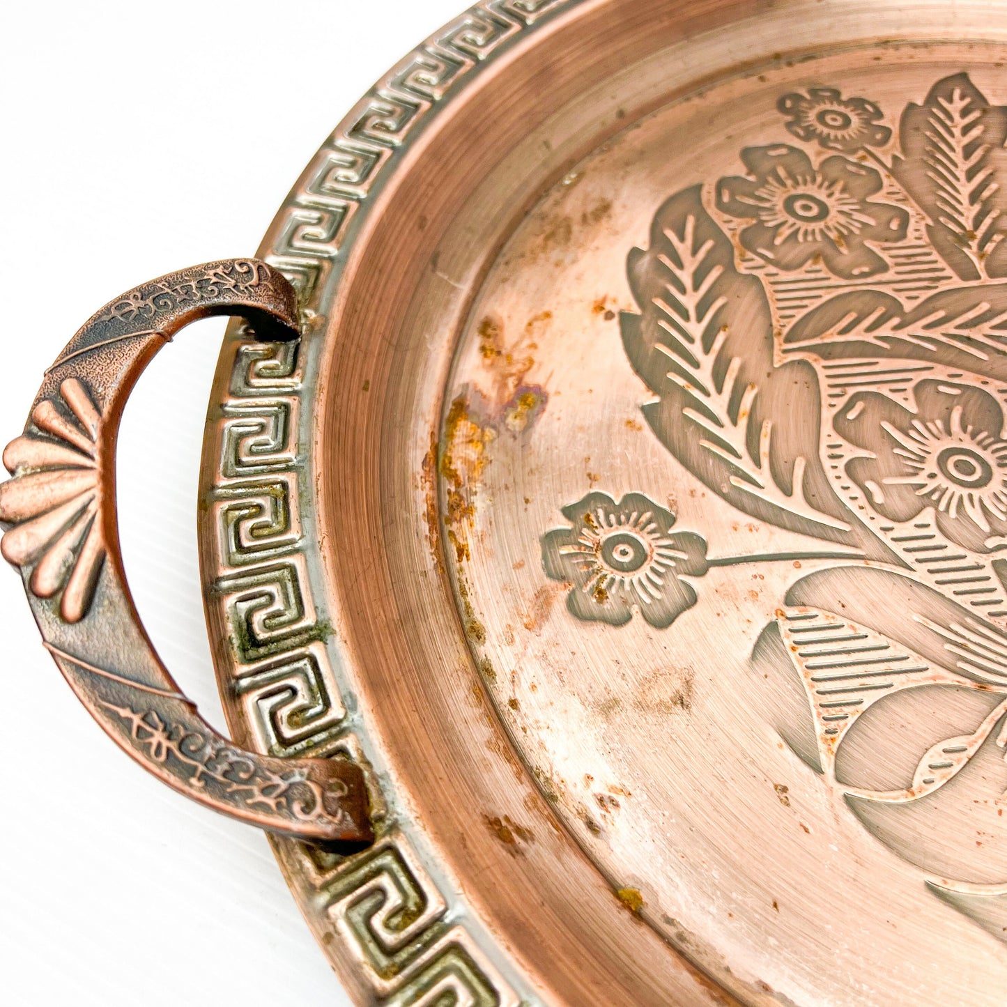 Copper colour metal round drink serving tray with flower artwork design