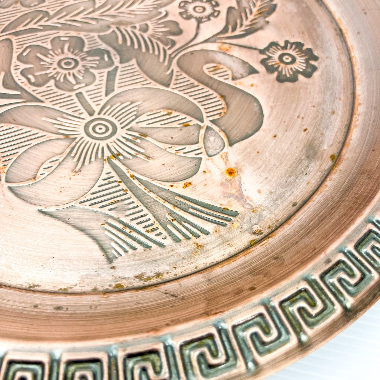 Copper colour metal round drink serving tray with flower artwork design
