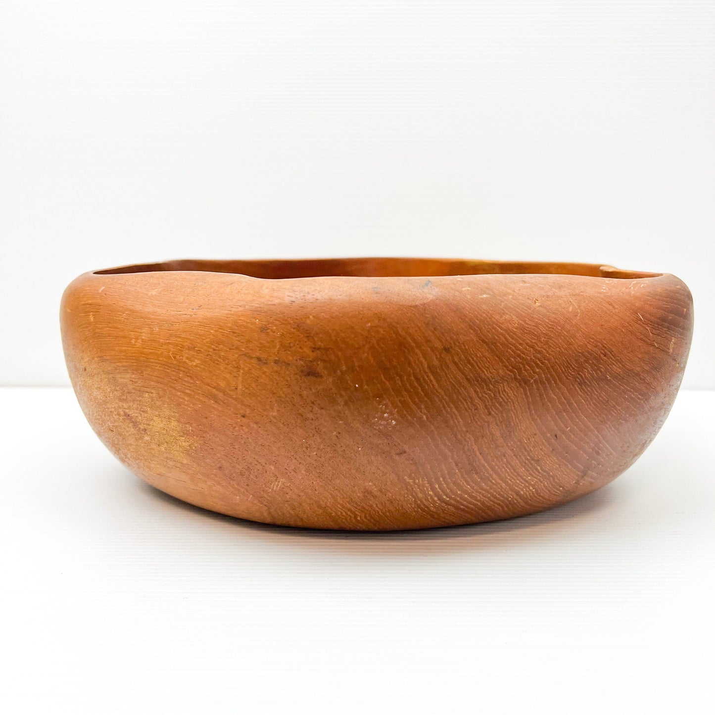 Large wooden serving bowl with ripple Wave edge
