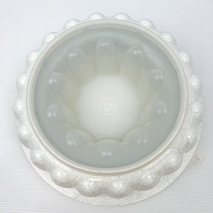 Tupperware white with black speckles plastic jelly mould