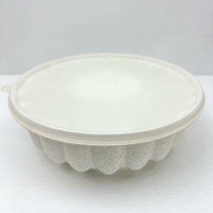 Tupperware white with black speckles plastic jelly mould