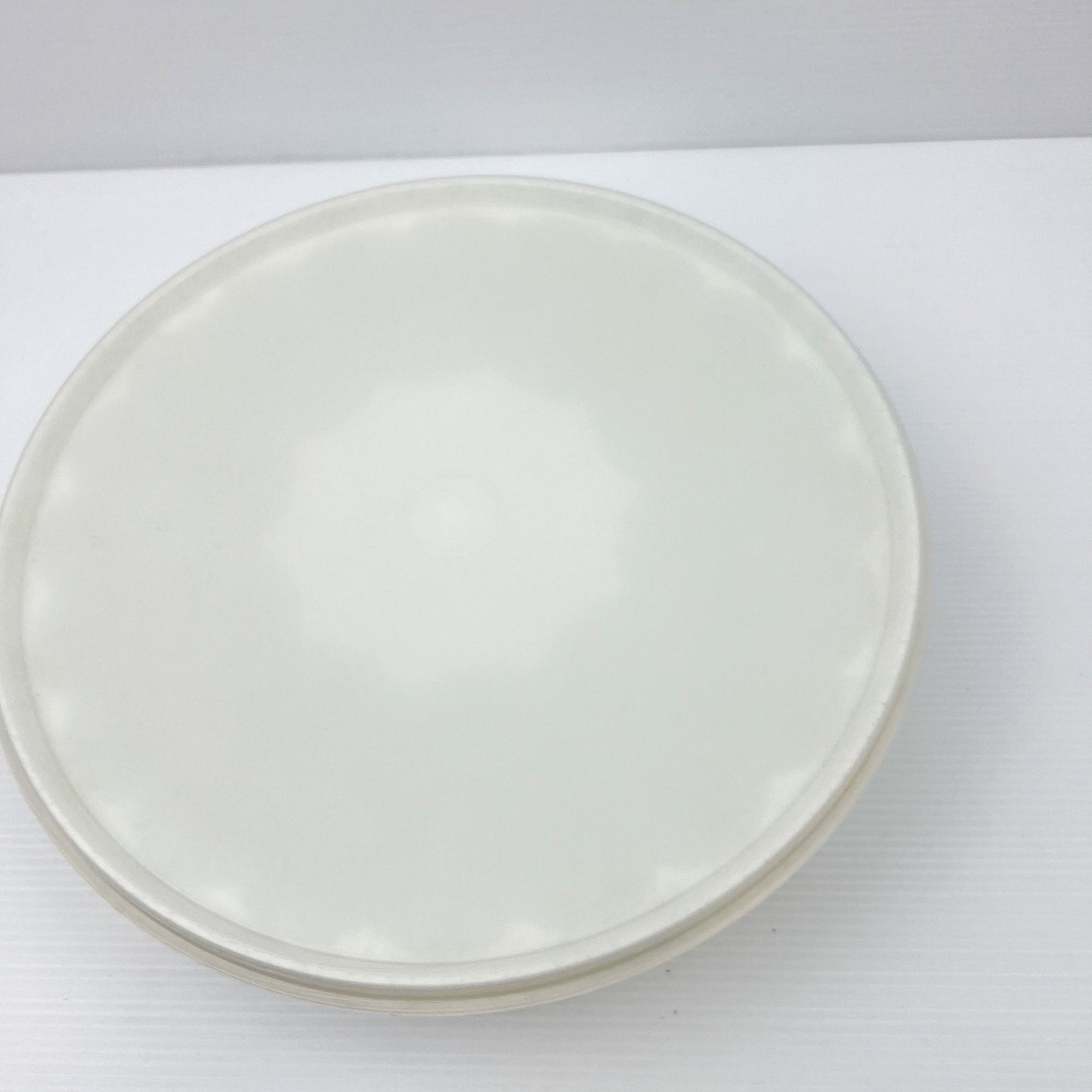 Tupperware white with black speckles plastic jelly mould