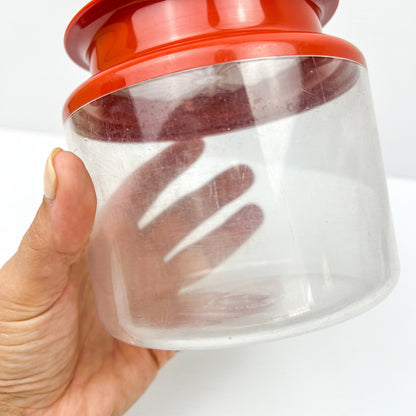 Red and Clear Plastic Tupperware Storage Container