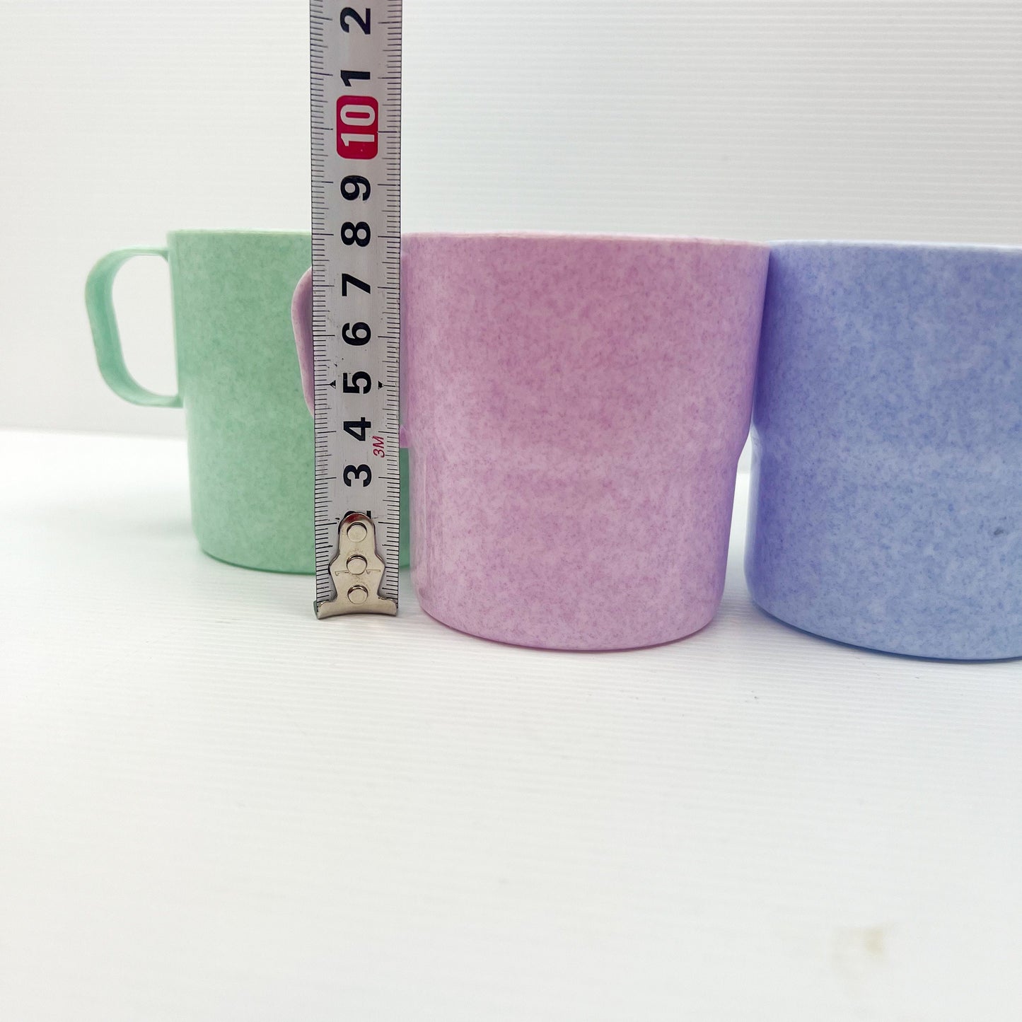 Retro Rainsfords multi-coloured stackable plastic mugs x 4