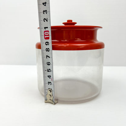 Red and Clear Plastic Tupperware Storage Container