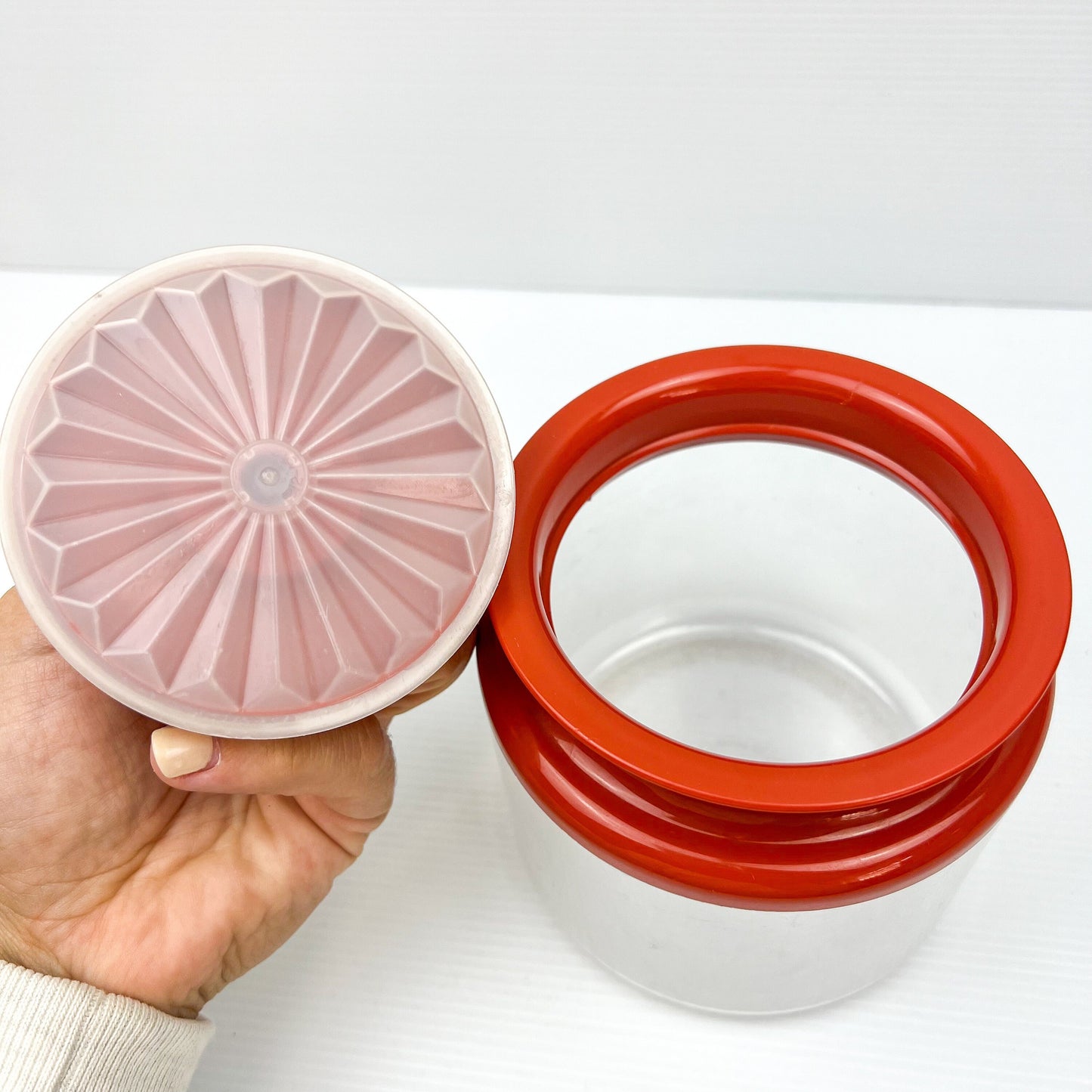Red and Clear Plastic Tupperware Storage Container