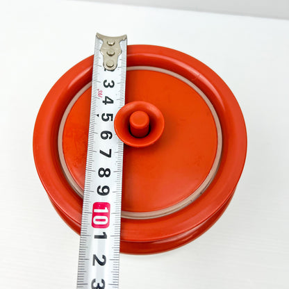 Red and Clear Plastic Tupperware Storage Container