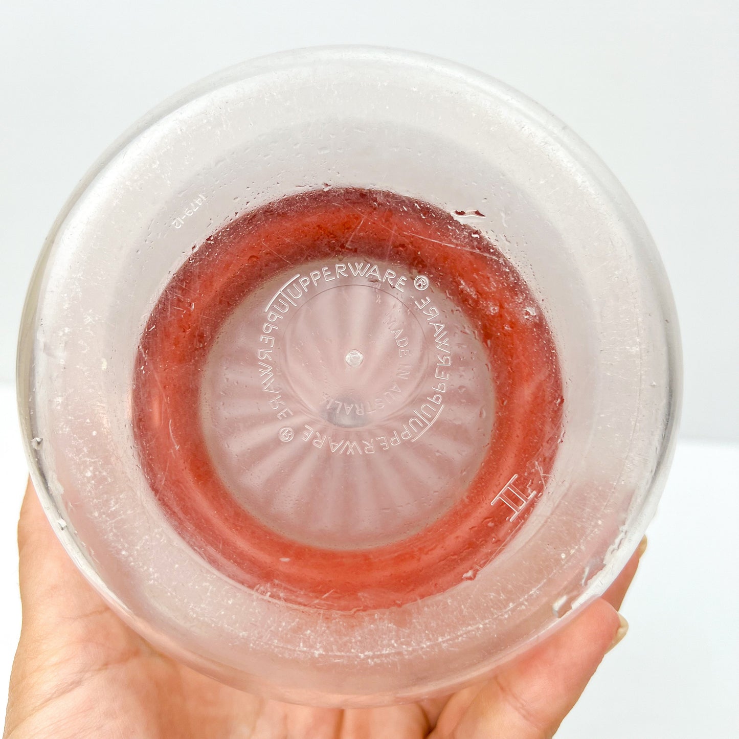 Red and Clear Plastic Tupperware Storage Container